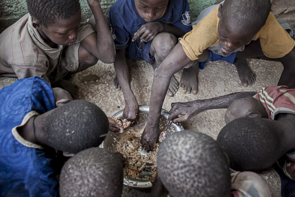 Photographic Social Vision - Talibes eating, in daara ( Koranic school), Mbour, Senegal